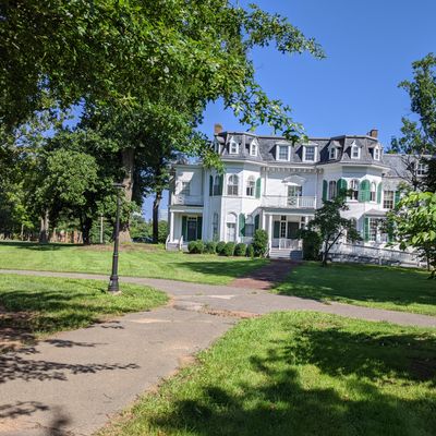 Campus building beside hole 1 tee pad