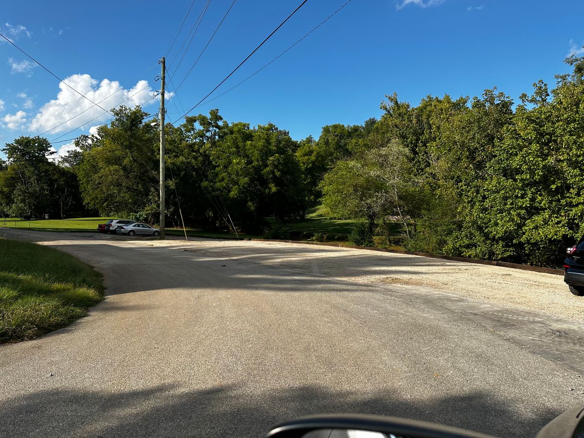 Parking located at the corner of Davis Street, first tee is located next to the brown pump house.