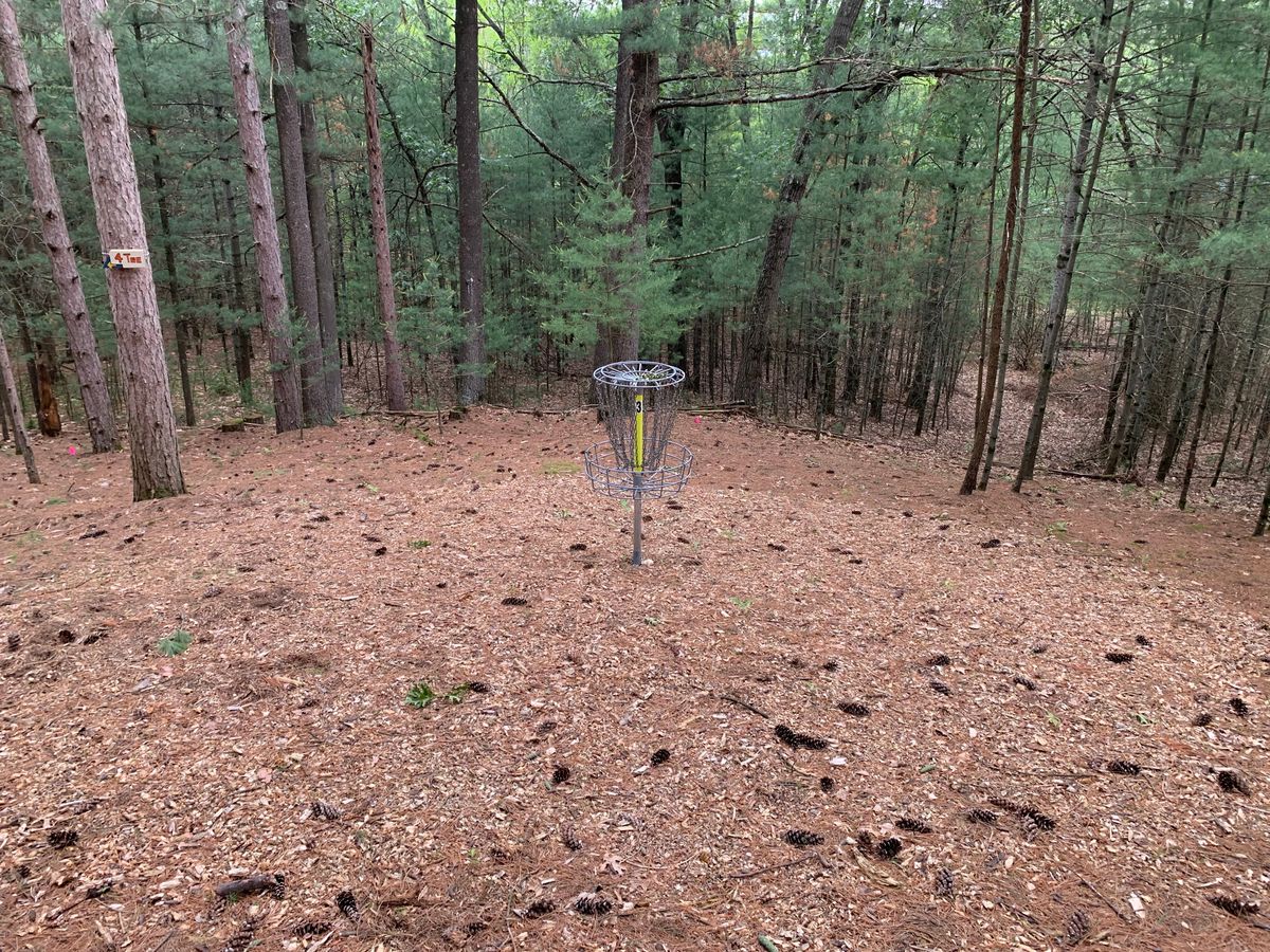 Basket location on significant downhill slope