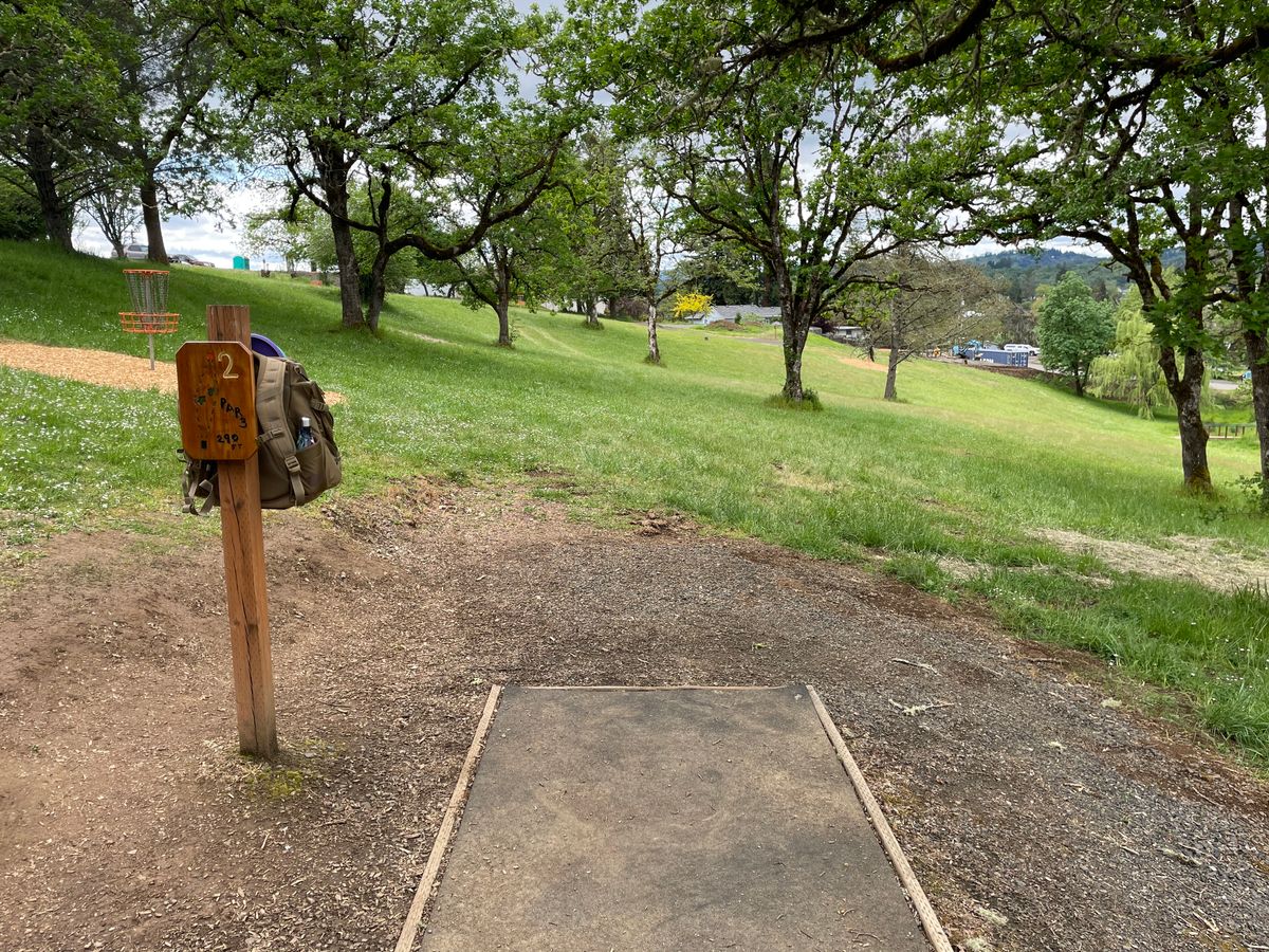 Hole 2 tee pad looking out towards the basket.