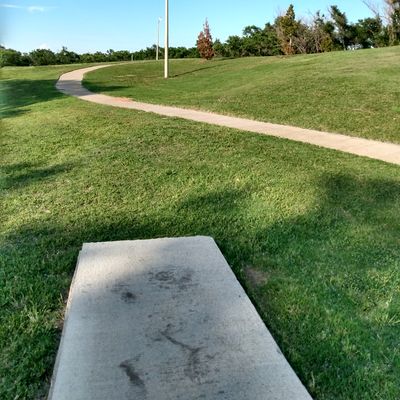 All concrete pads..long pad for hole 1