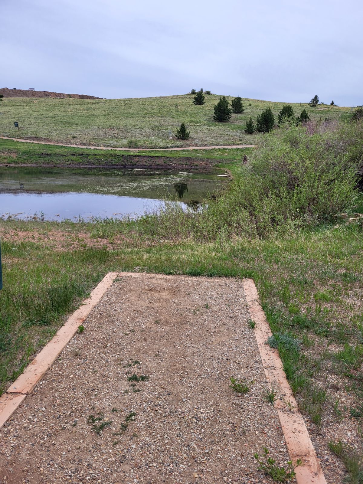 Hole 1.  Shorty over the pond.  Alternate tee available.