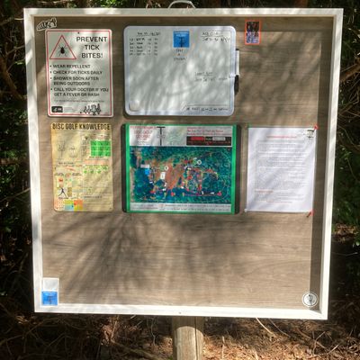 Information board in front of club house.