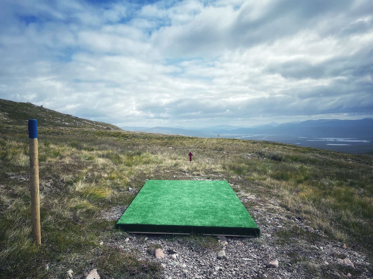 Hole 7 tee pad with Schiehallion views in the far off background