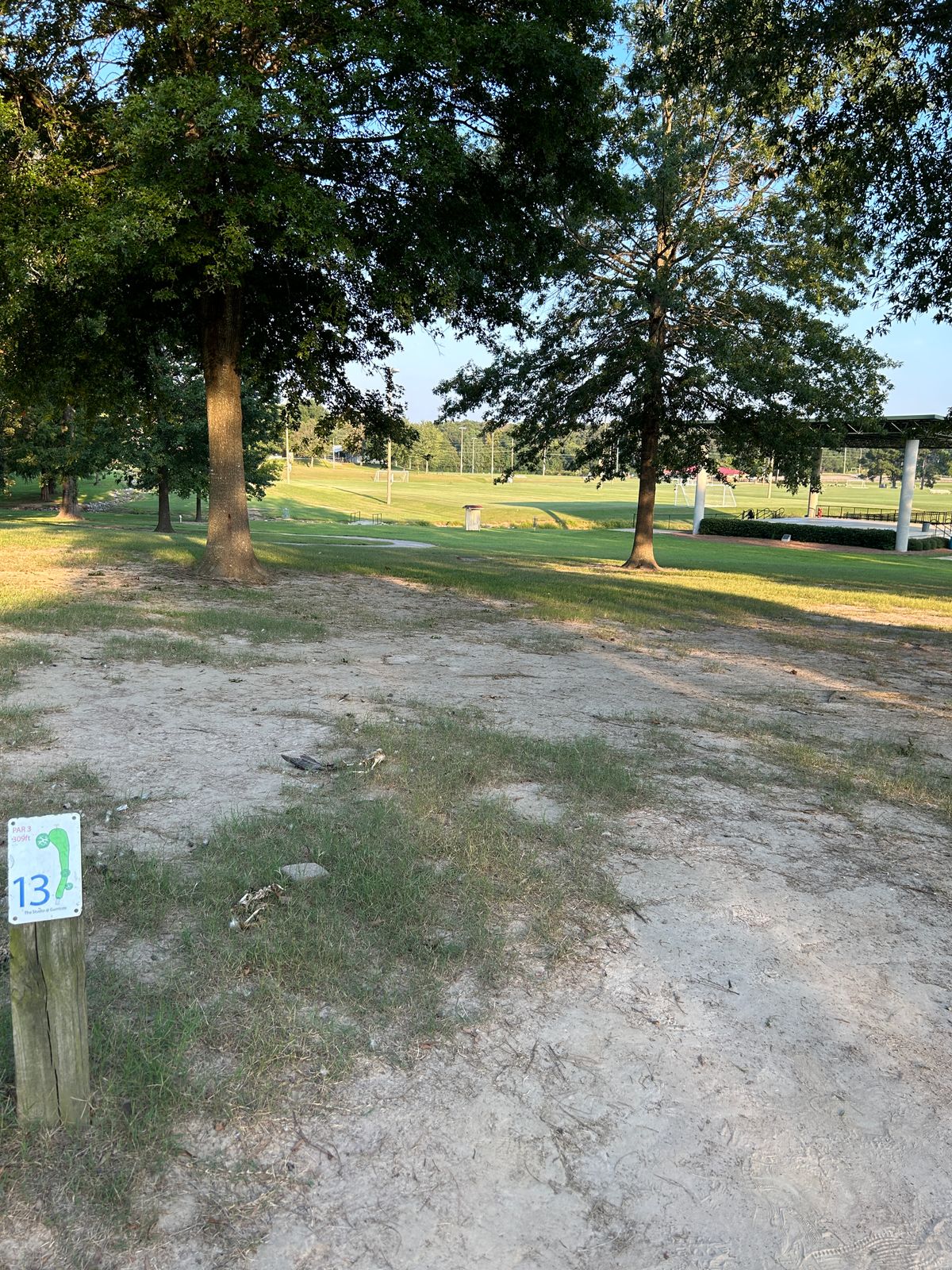 Hole 13 plays down the hill to the right basket. There is a rocky creek slightly long