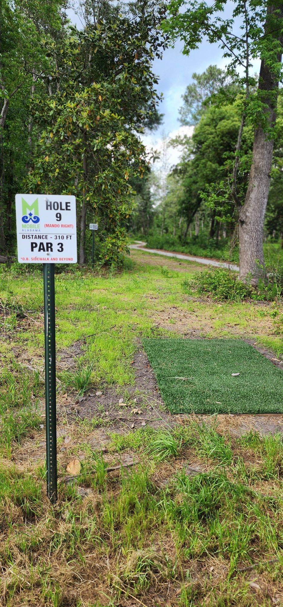 Hole 9 ob sidewalk and beyond to the right.