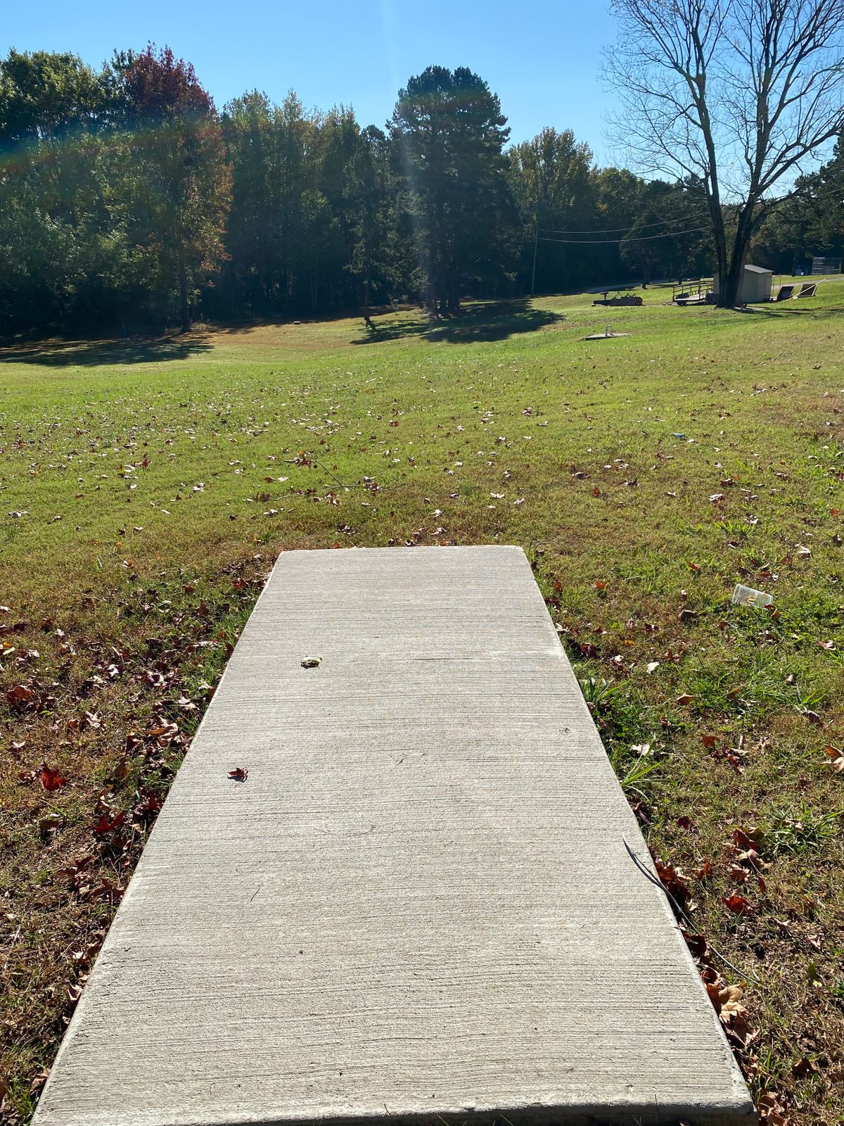 Hole 1 tee pad (red)