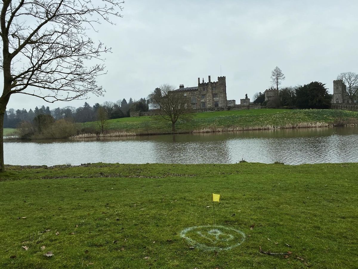Hole 18 basket location looking to the castle . B position is across the lake. (Pre install photo)