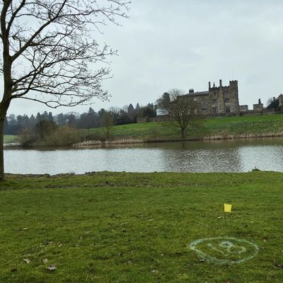 Hole 18 basket location looking to the castle . B position is across the lake. (Pre install photo)