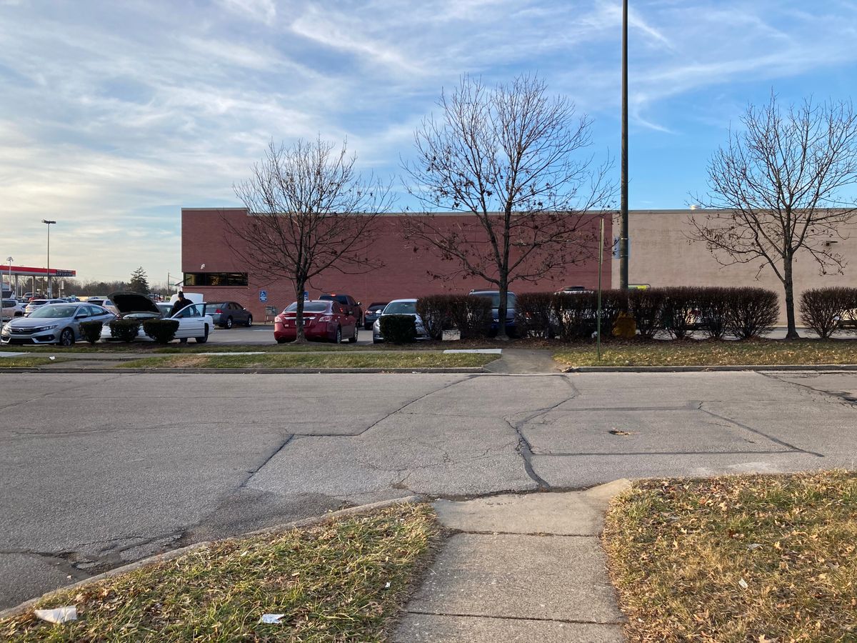Park in the Kroger parking lot on the side of the building.