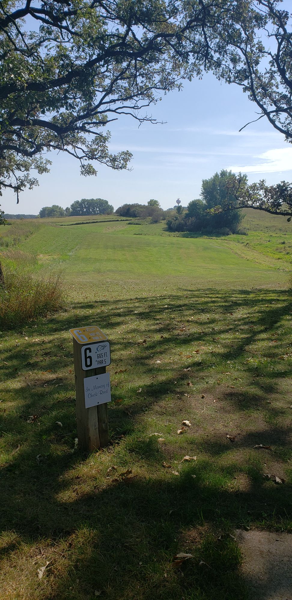 This hole is a long open fairway that the wind might change your throw!