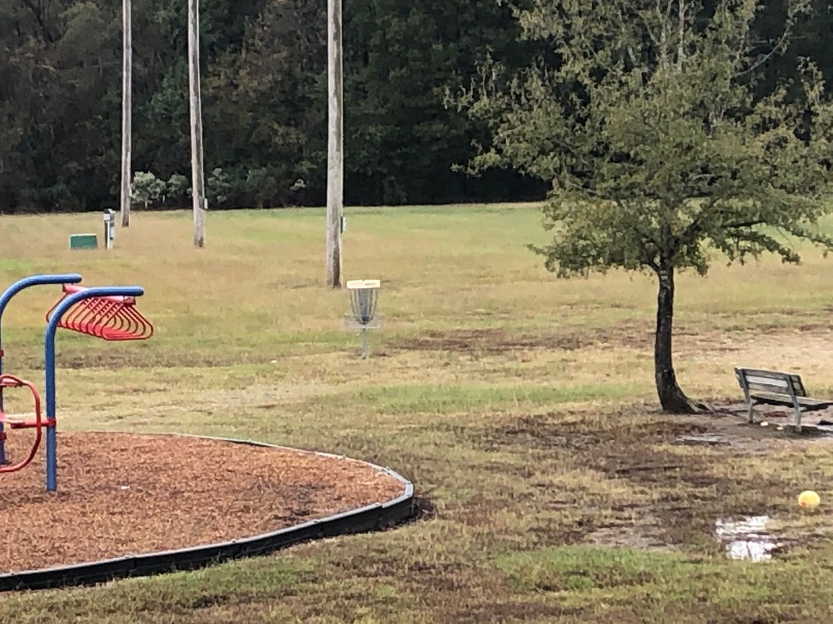 Single basket located behind school building.