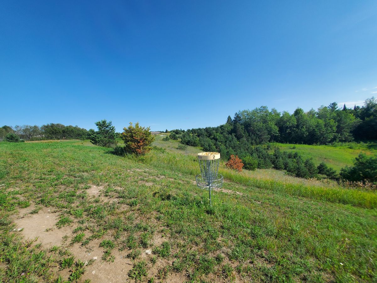 Hole 2 looking back 400ish to pad. Pine trees on right are about 100ft down in a valley.