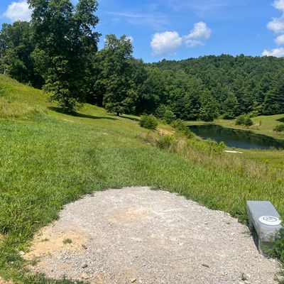 Tee for hole 2 is on top of the dam to the right.  