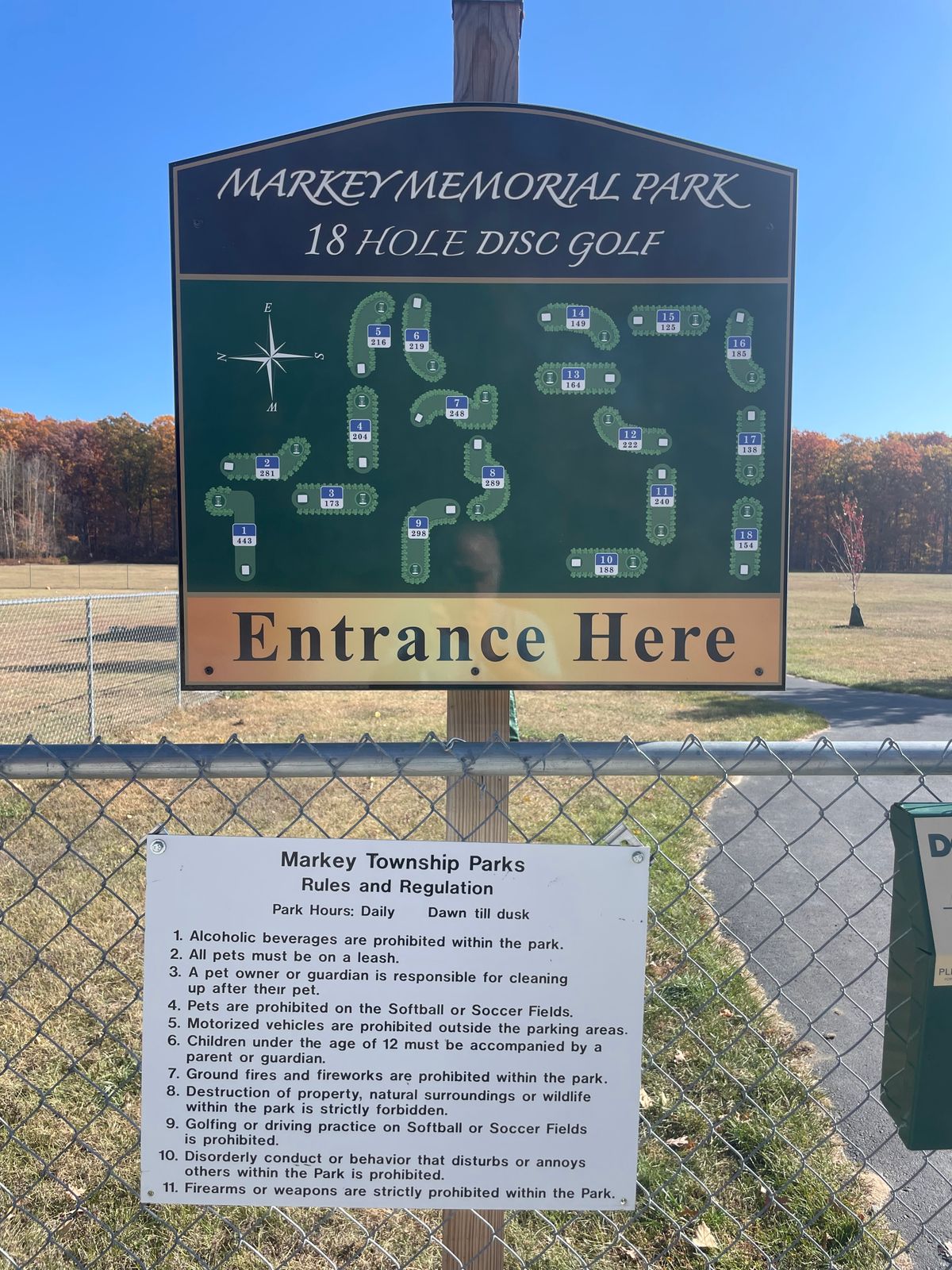 Follow path past dog park to the first tee. 