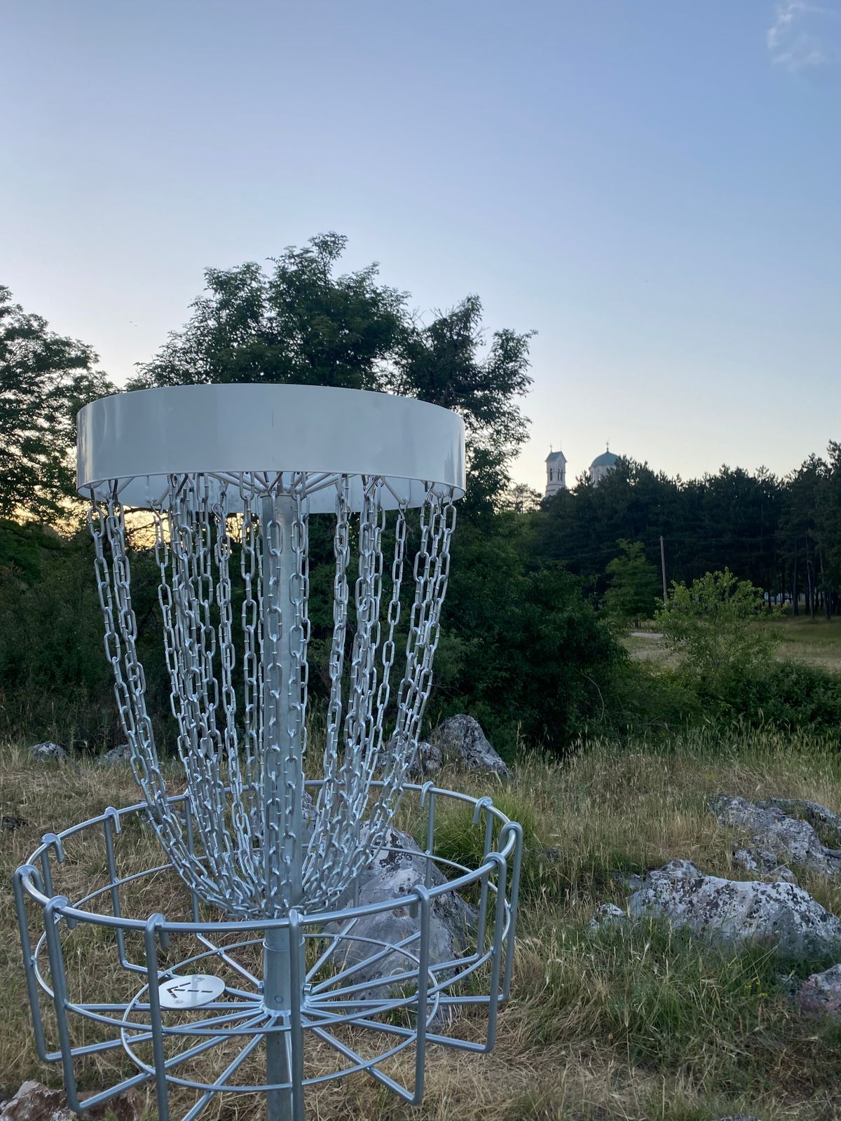 Basket of hole 16 with the beautiful Orthodox Church in the background