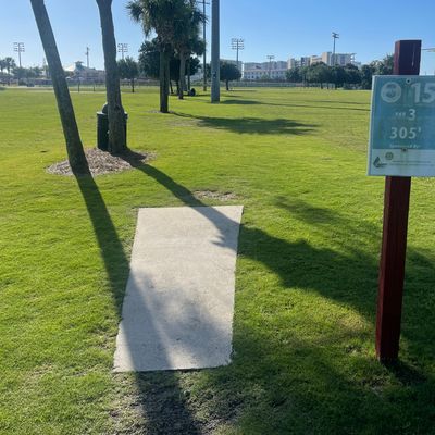 Hole 15 is wide open on both sides with the basket straight ahead