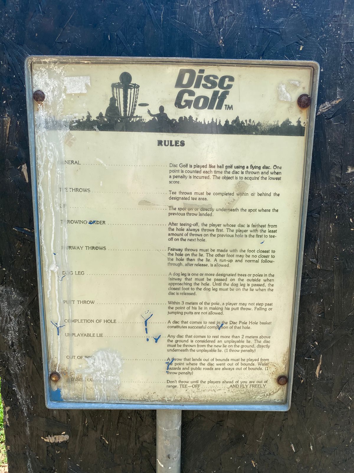 An amazing old placard covered in bird poop.