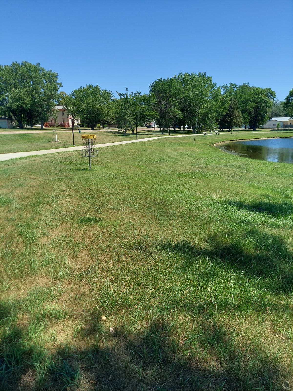 Hole 6 basket, sits farther away from the water yet slightly close to the path.