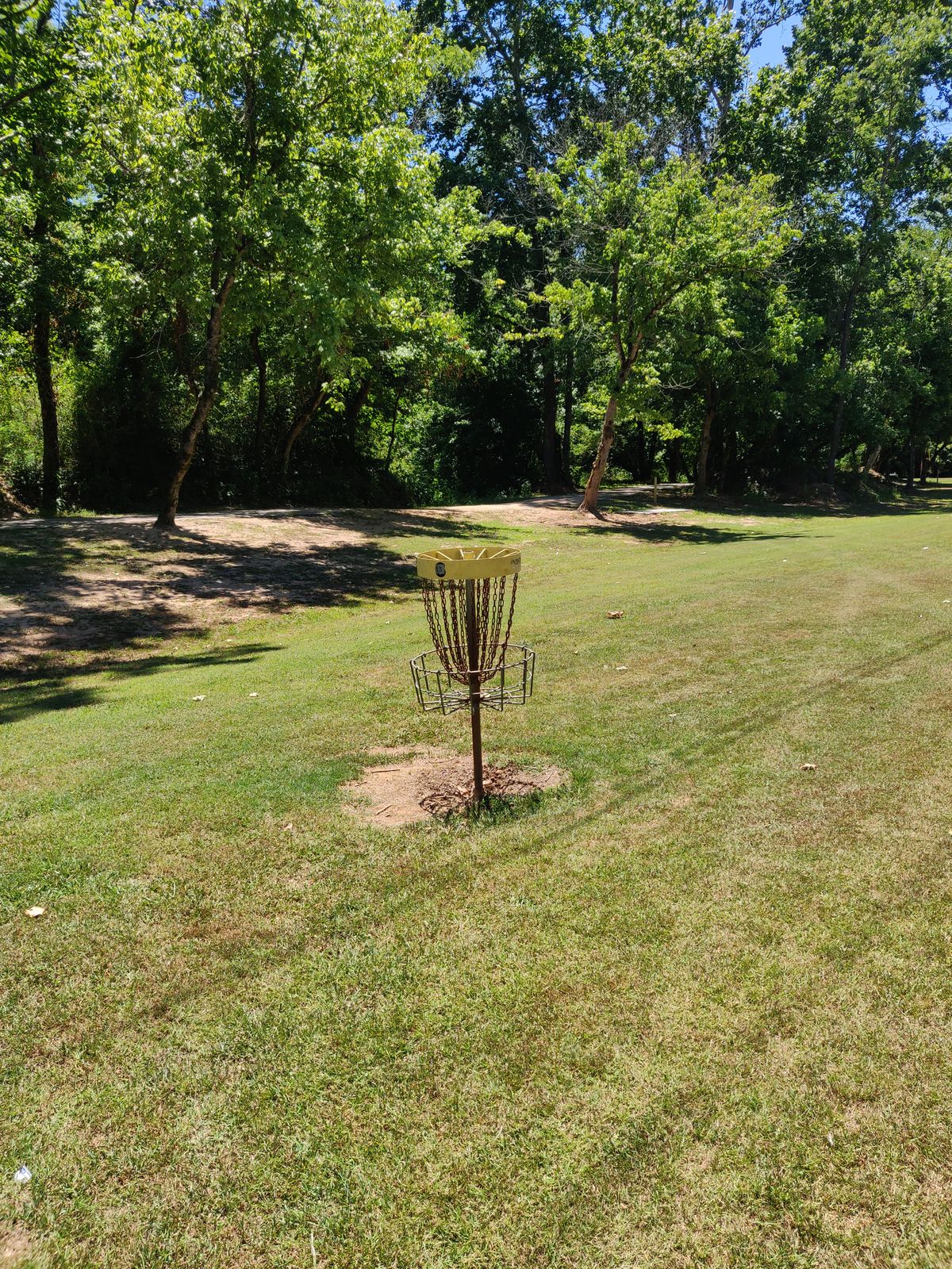 Hole 13 basket. Looking towards hole 14 tee pad.