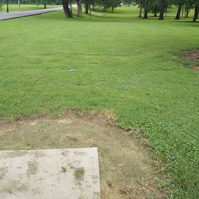 Hole 1 runs along the right side of street.
