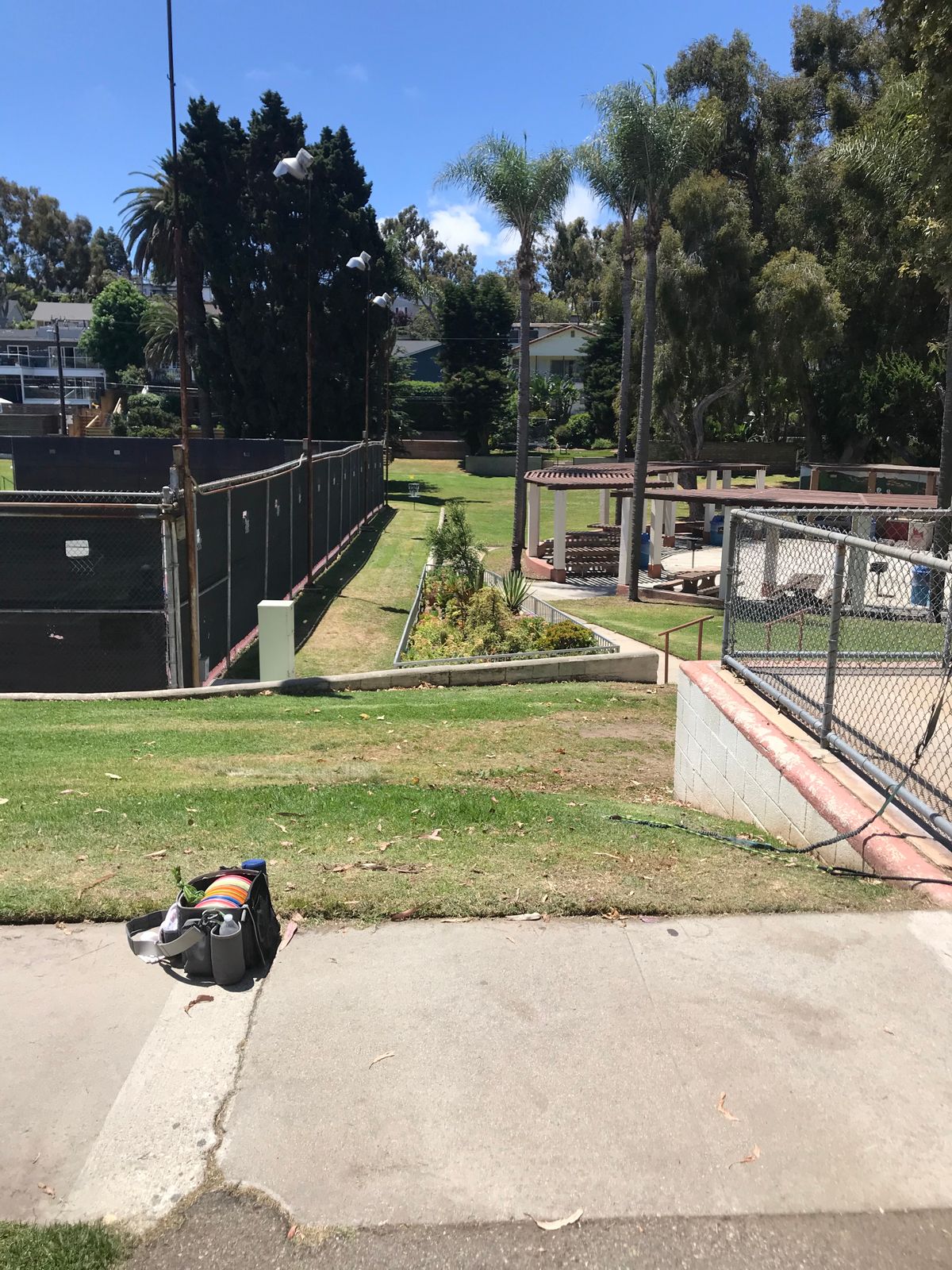Hole #9 - Elevated finesse ace run opportunity. Tennis Court & Pavilion OB.