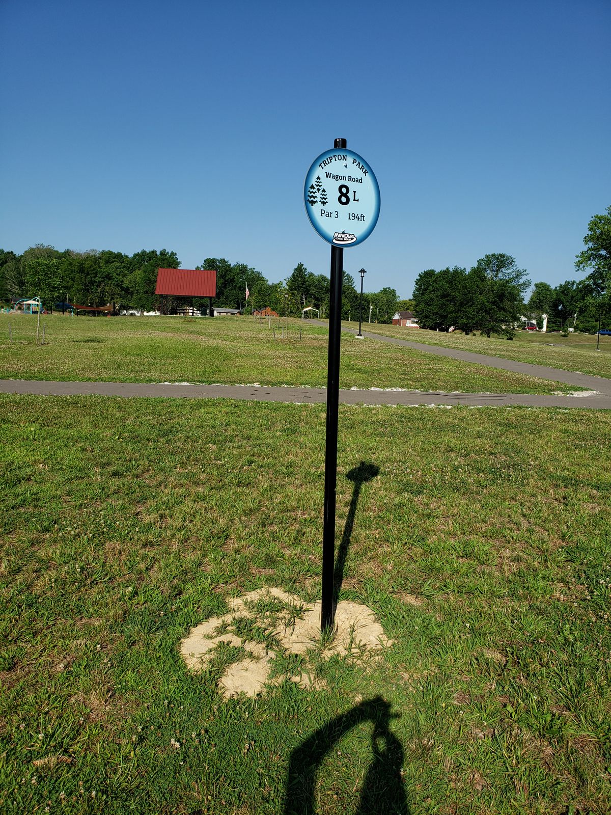 #8 Tee Sign.