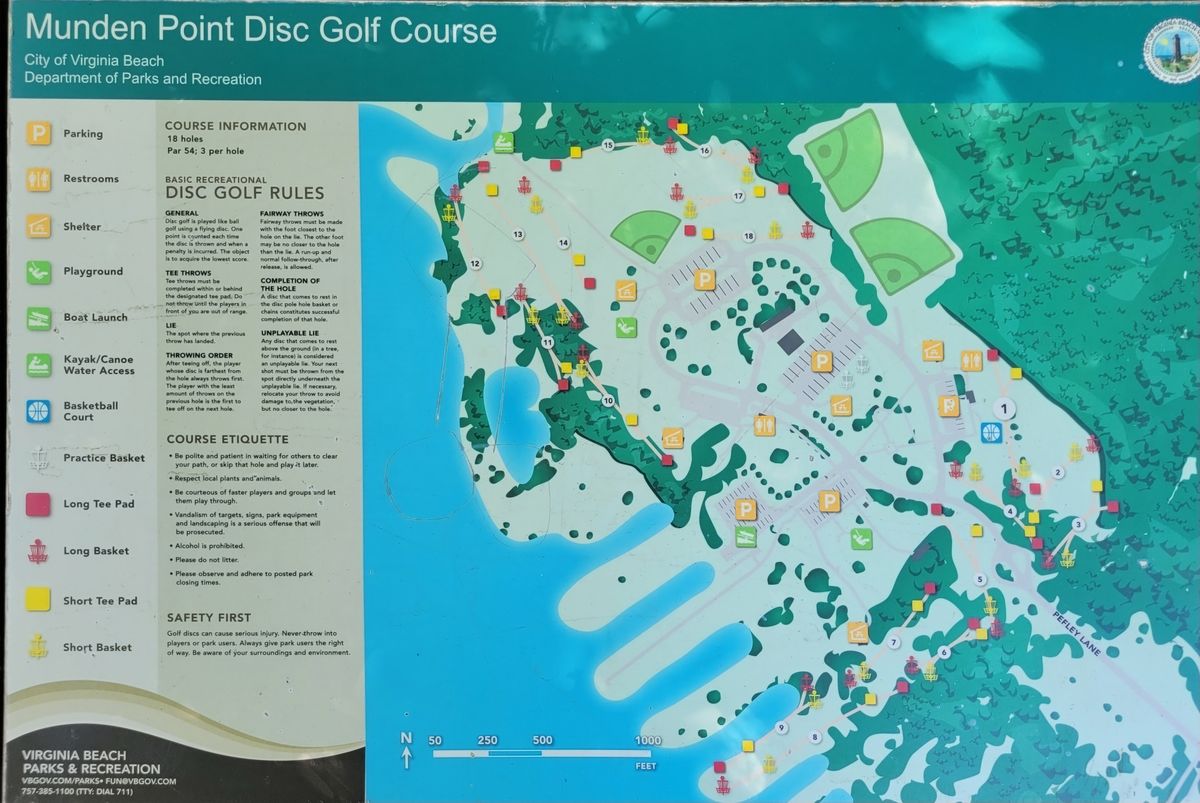 Park layout, practice baskets near the central parking area.