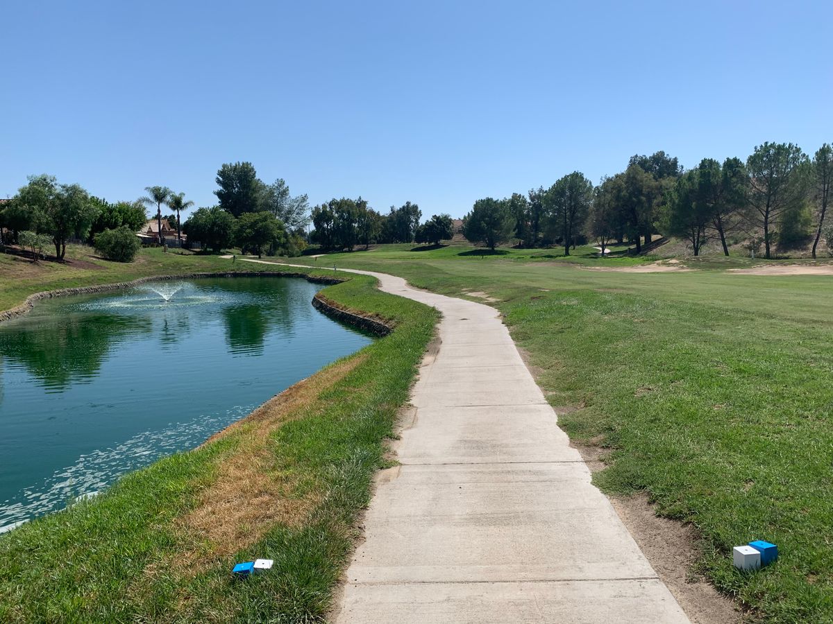 Omega Hole 17 Tee
