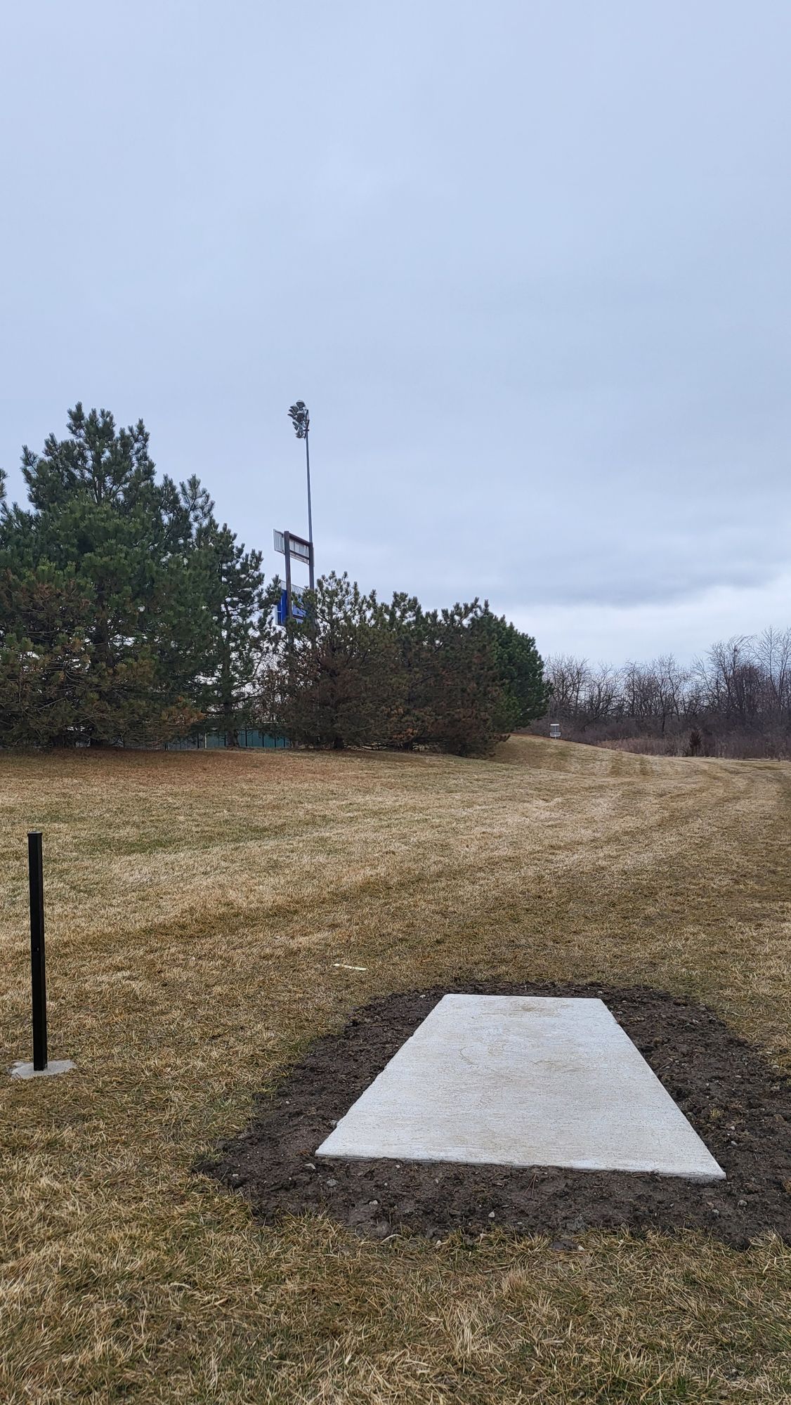 Hole 5 Teepad. North of the baseball field. Fun hideaway hole.