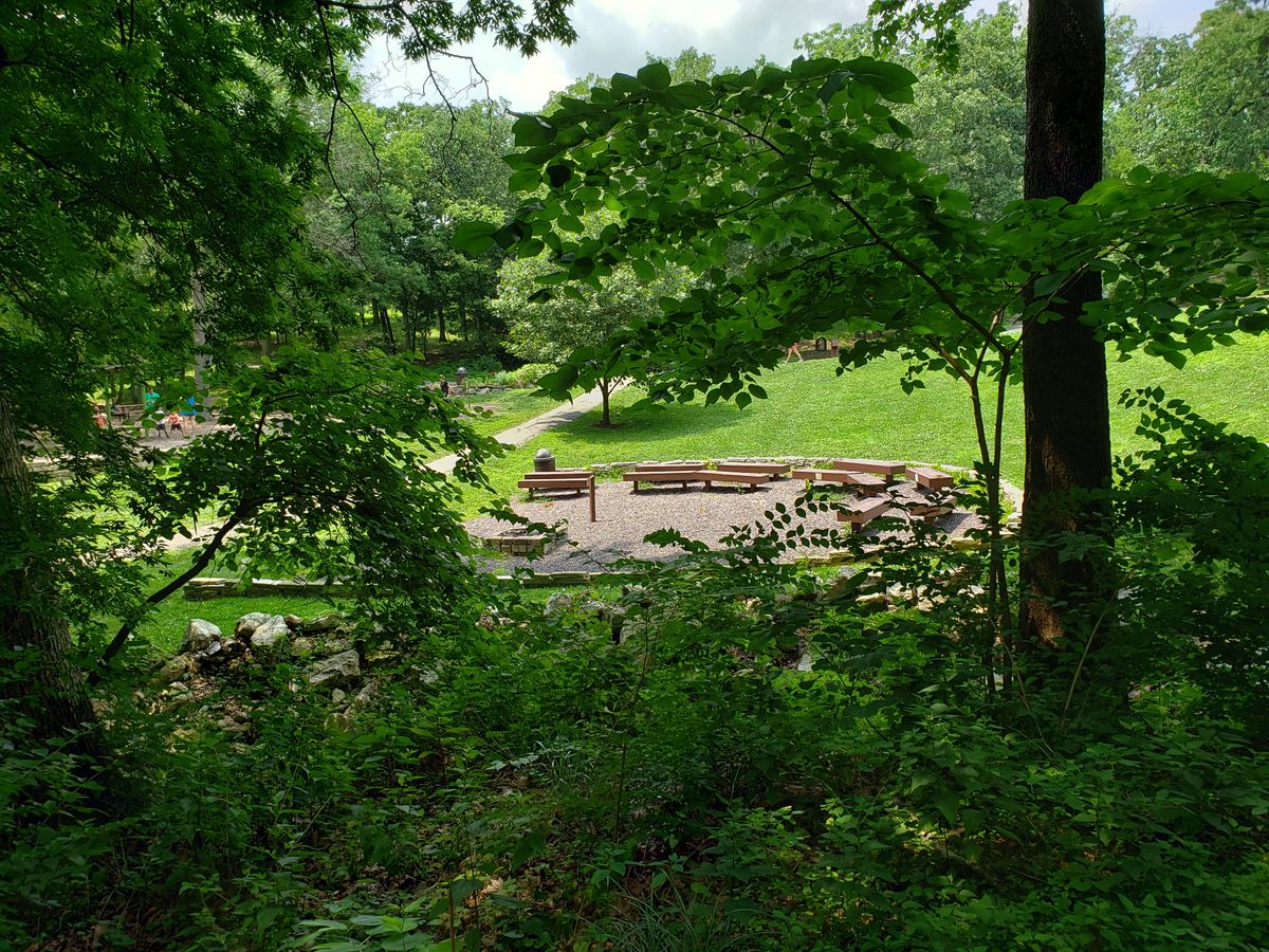 Pass campfire seating on way to #8