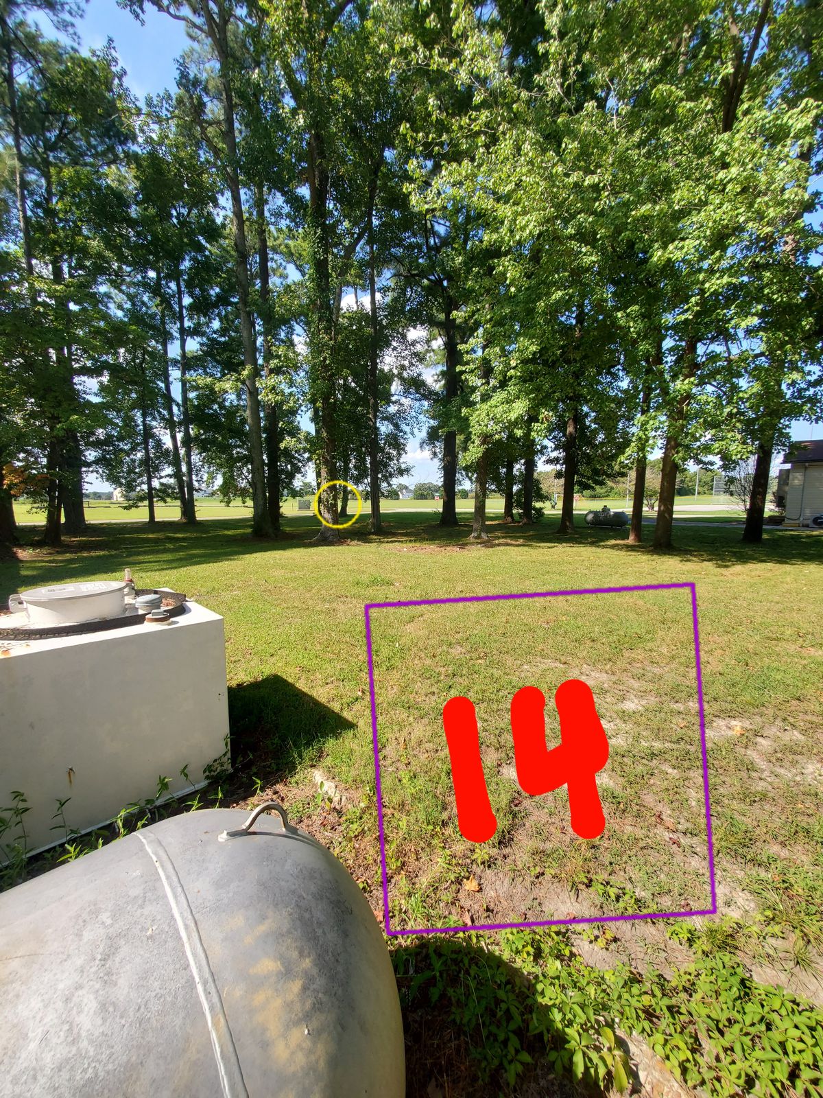 Hole 14
Walk to backside of mechanic shop and shoot from next to used oil containment
Basket is through woods on corner.
