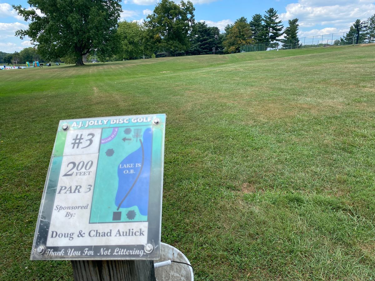 Hole 3, taken 9/4/2023.  Sign is outdated; there’s no longer a lake on the right side, just grass.