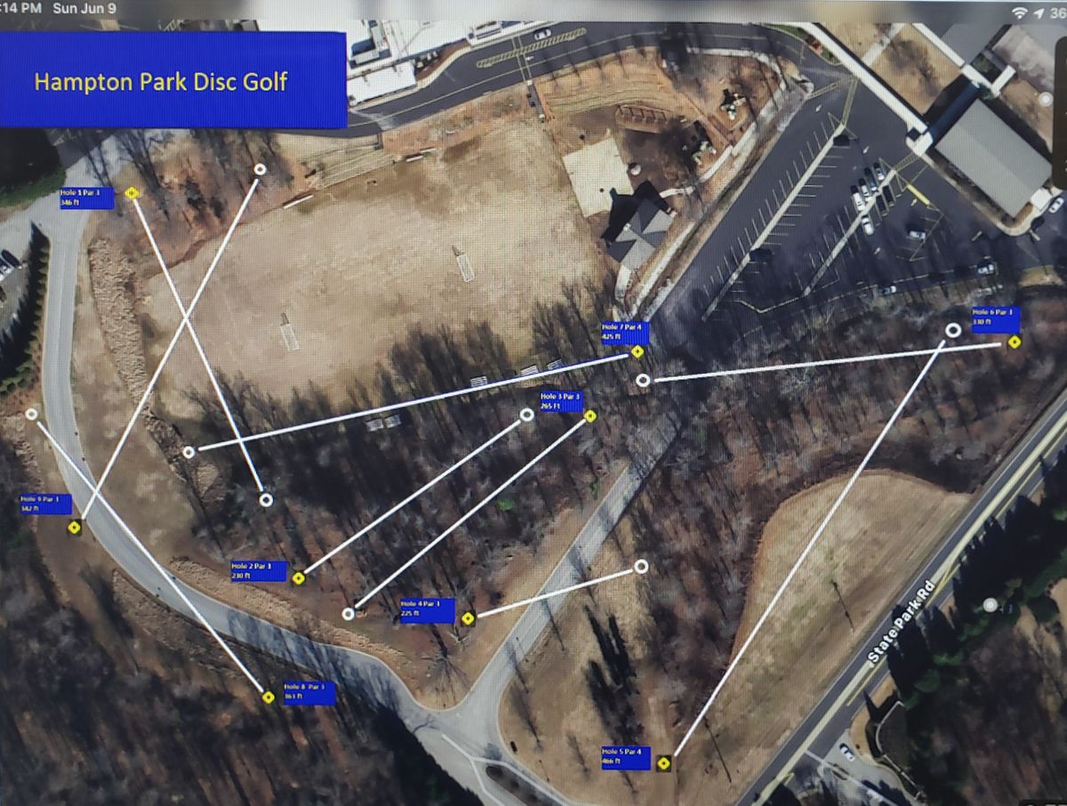 Parking is in upper lot by the blue box in top left corner.