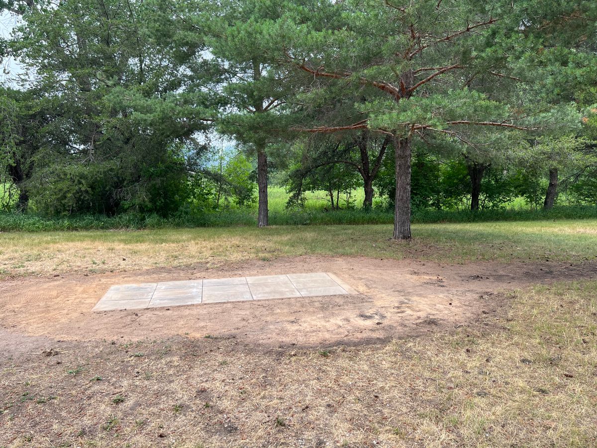 4’x10’ Most of the surrounding ground is pretty level now. Please enjoy and help maintain the course