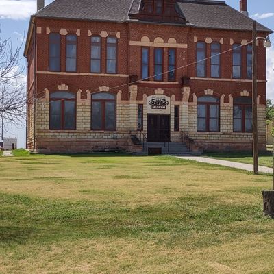 Formerly the county seat and courthouse, this beautiful historic building is now the Butterfield Trail museum.  There's also a playground here for the littles so you can play around and they can play around.  Canned soft drinks and ice are also available in season,