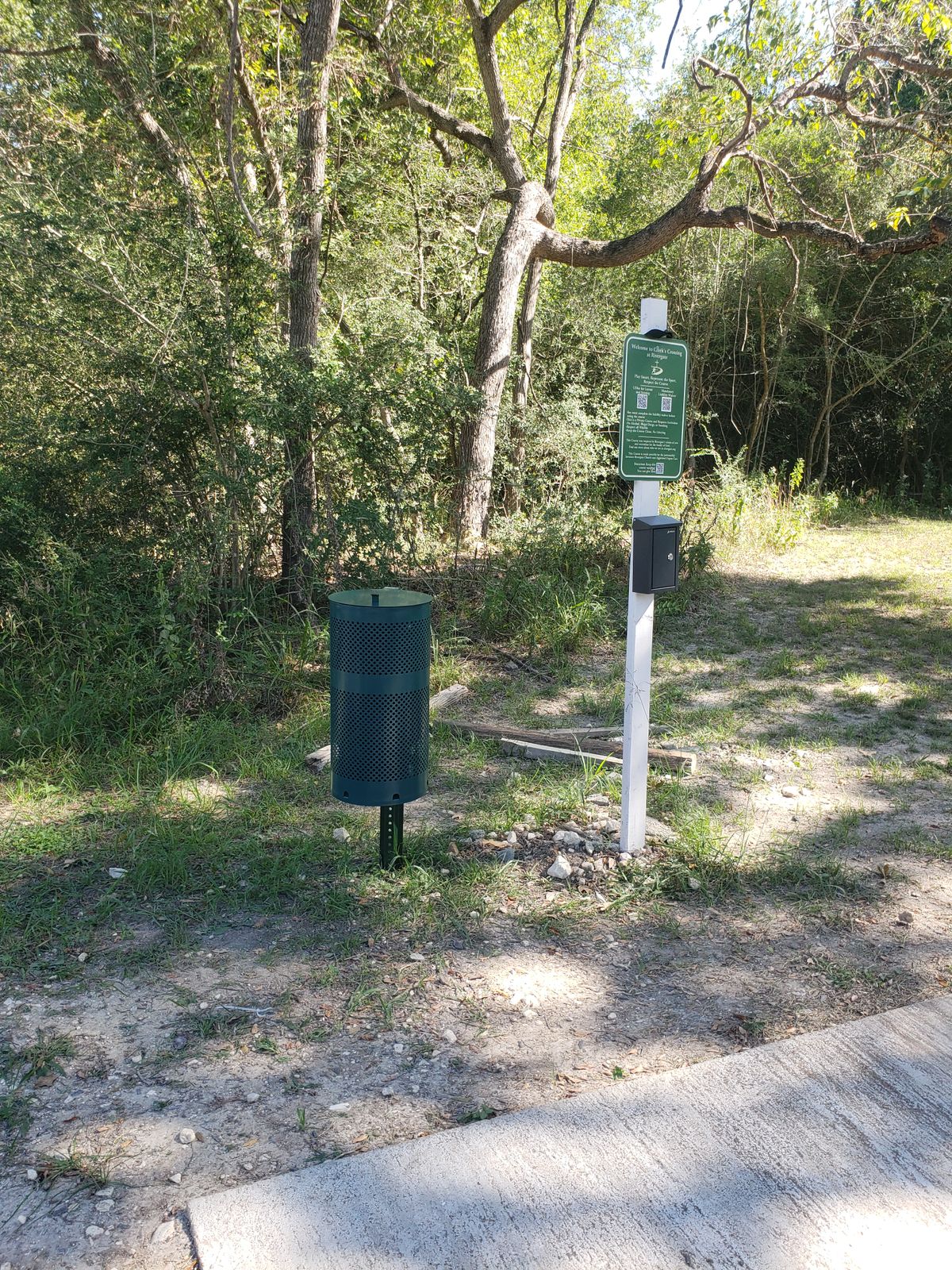 New trash can and donation box at hole 1