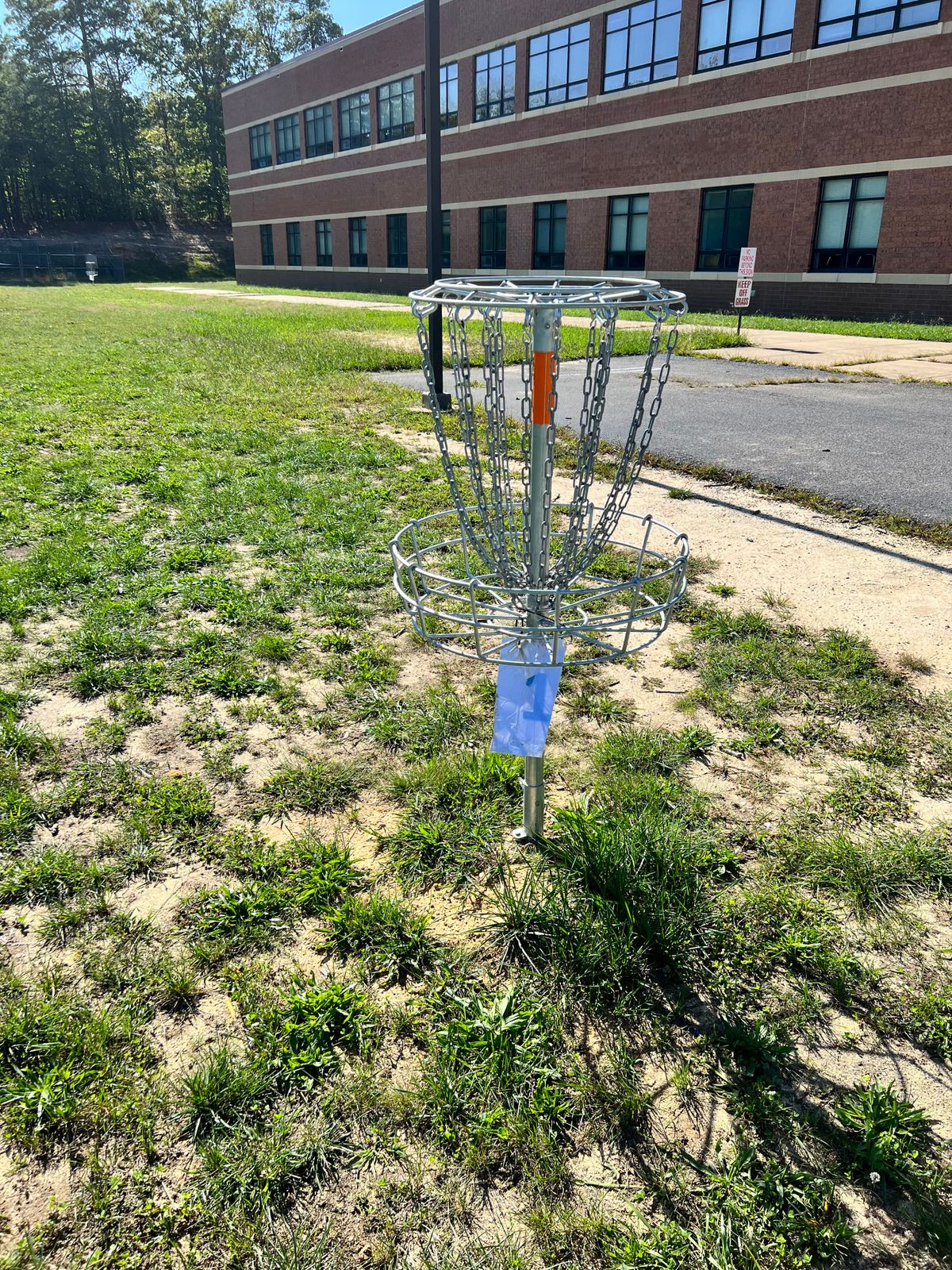 Hole 1.  Longest hole.  Start by the parking lot to the first hole by the school.