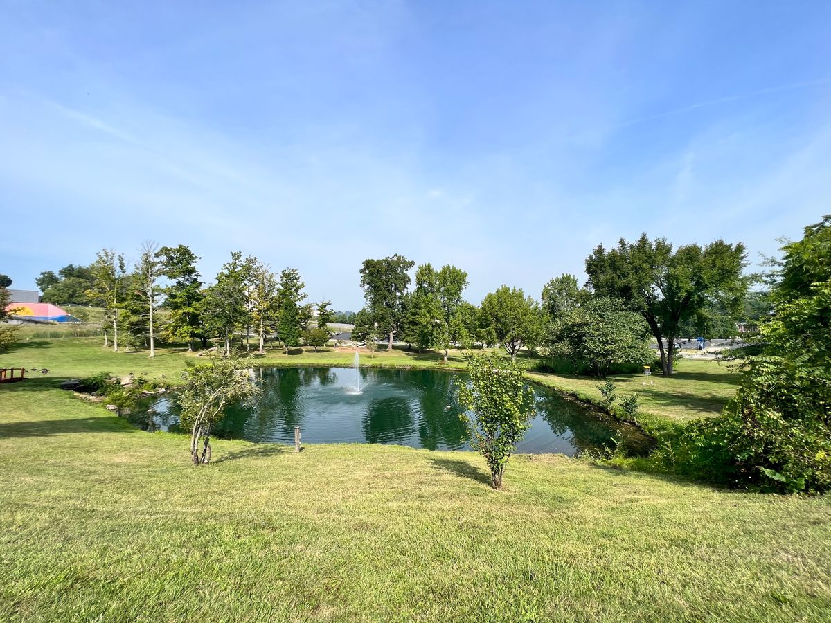 Course plays around the pond.