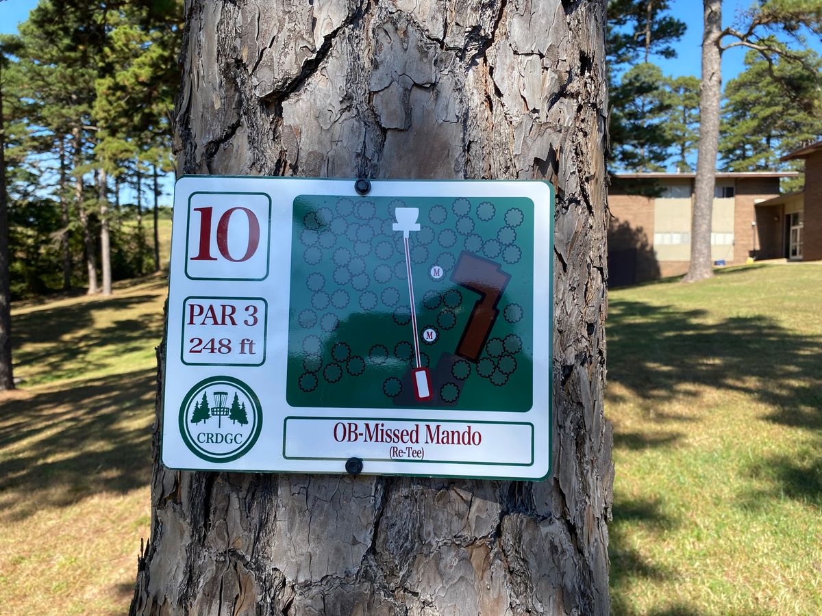 Hole 10 sign (red/white)