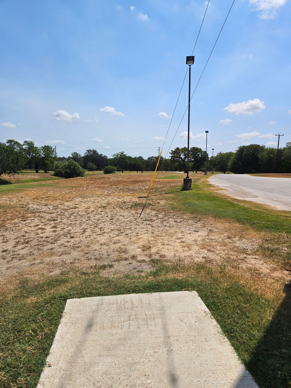 Tee box on hole 7 after pole anchors were put in