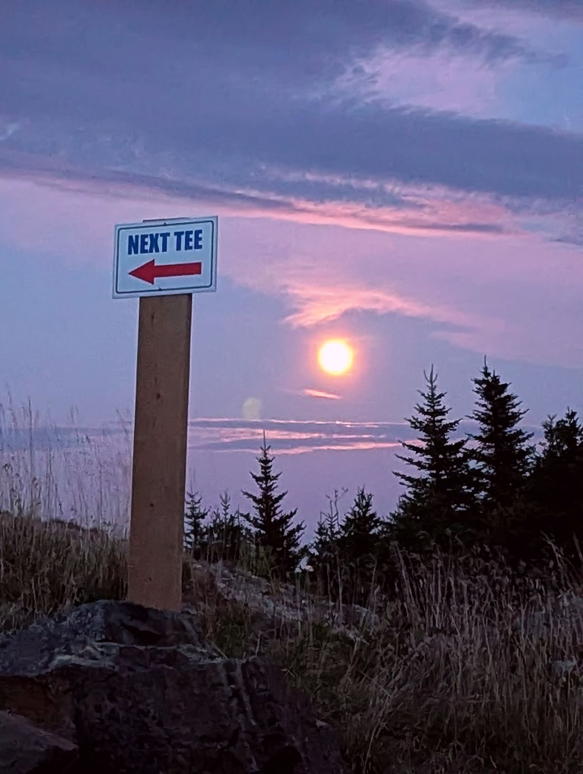 Marker between hole 13 & 14