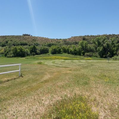 15 tee from the fence line, 6 tee further up by the stake (14/5 basket in right of photo)