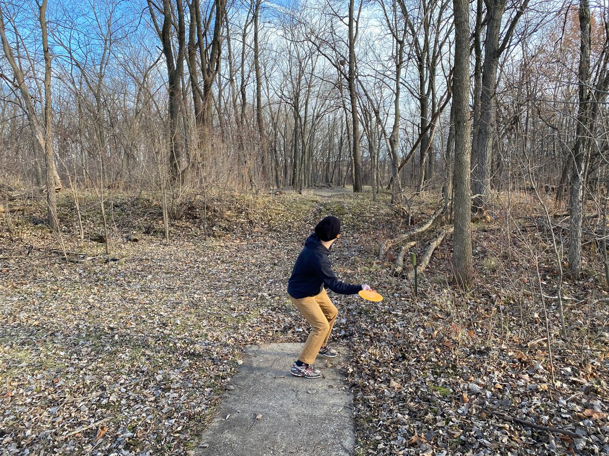 Hole 14 long pad. It’s back to the right behind the hill that 13’s pin is on.
