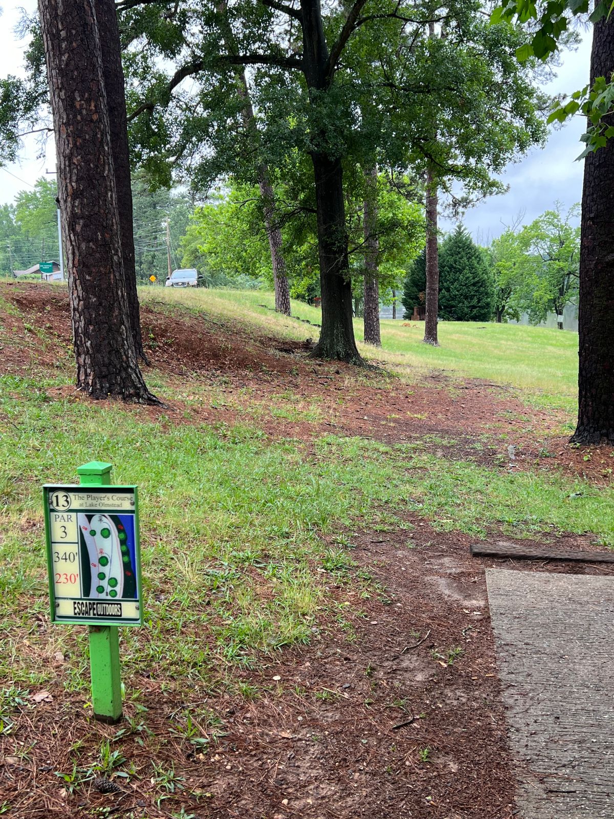 Hole has short red and long yellow basket. 