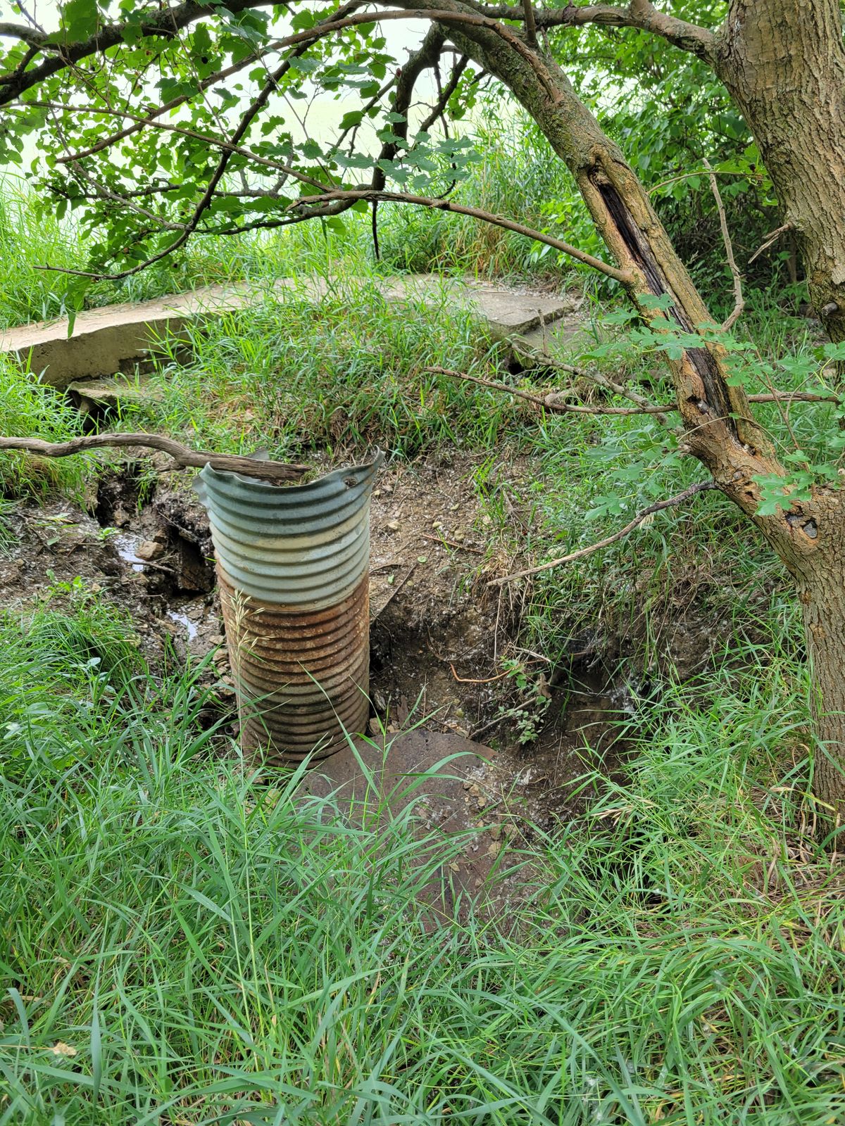 Giant cistern pit near the water, beware