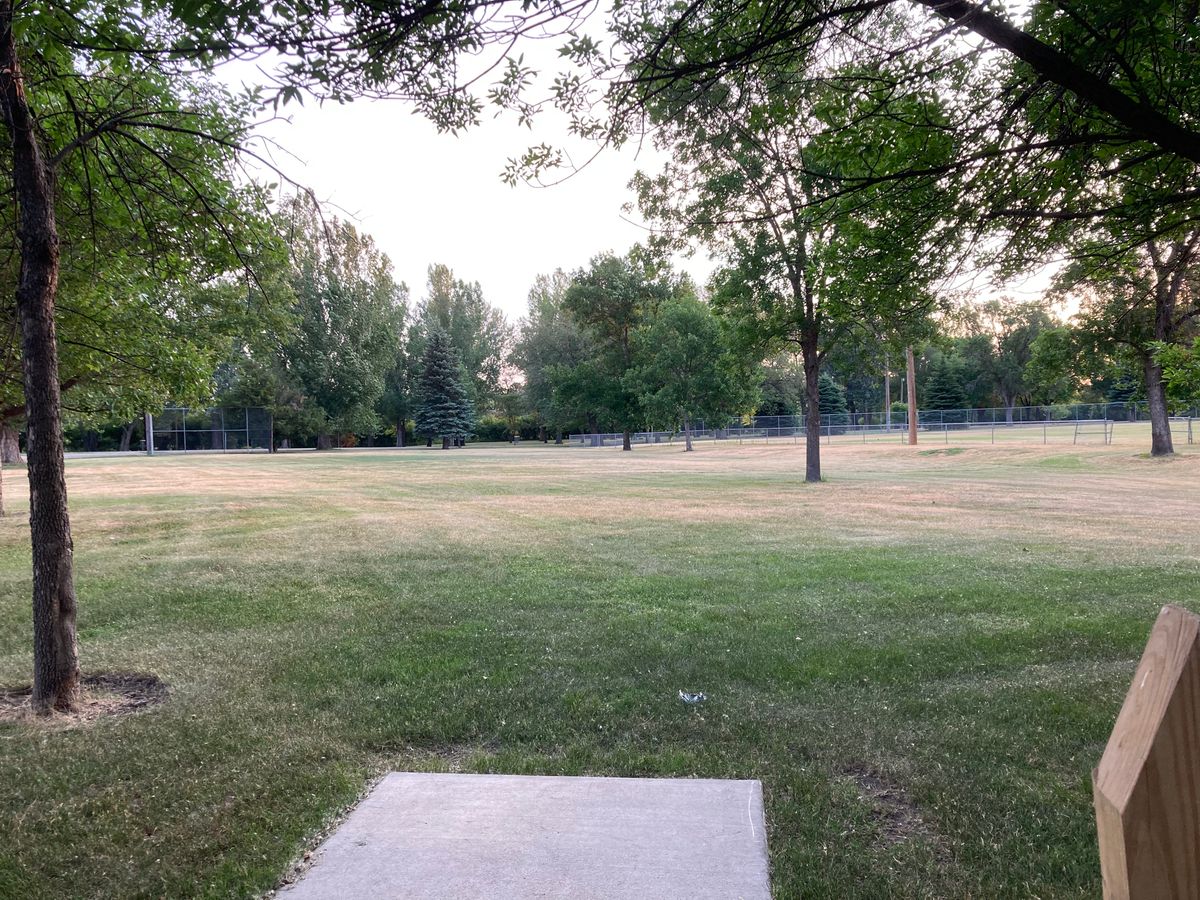 Tee 9,missing hole# (bathroom w/ running water but no fully closing door just right of Tee 9)