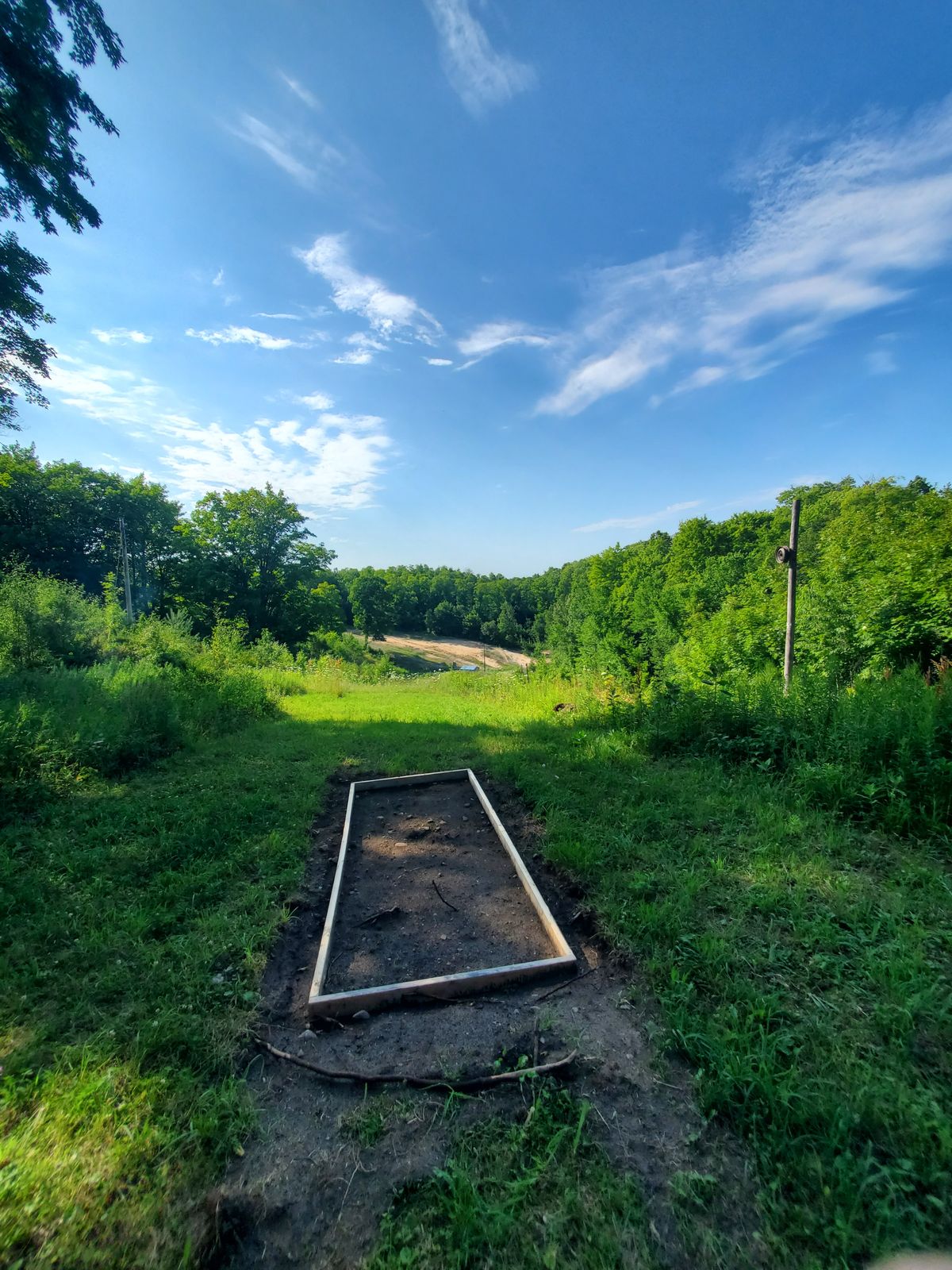 Hole 5 pad. Basket all the way down the ski hill to edge of sand in the distance. Can't wait to see Paul Mcbeth bomb one out there.
