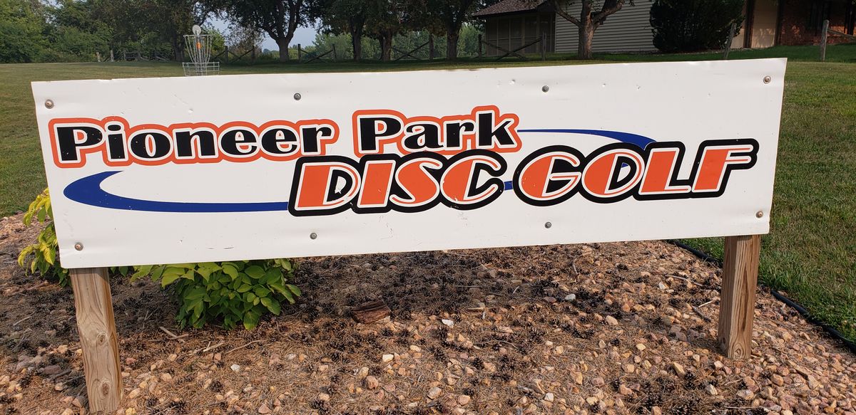 Park at the bottom of the hill from this sign.