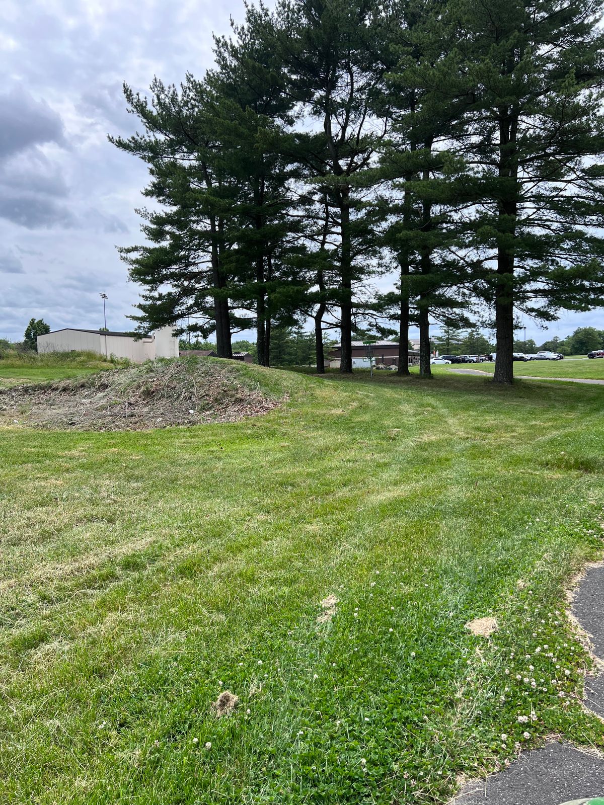 Hole 18 basket. Bunkers/sand traps play as hazard; penalty stroke play from where it lies.